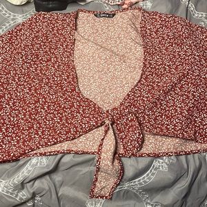 Red and white flowered blouse crop top